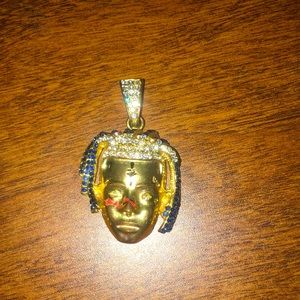 Gold and diamond xxx pendent